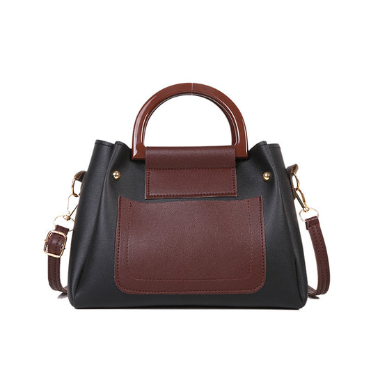 The Two-Tone Top Handle Crossbody Bag