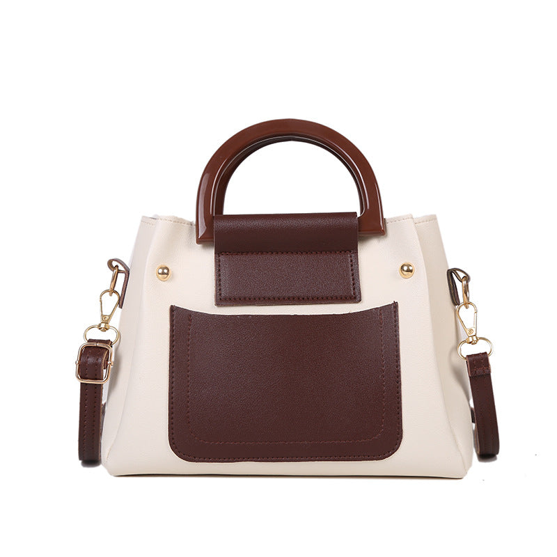 The Two-Tone Top Handle Crossbody Bag