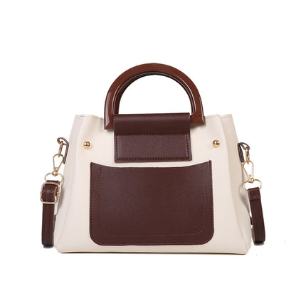 The Two-Tone Top Handle Crossbody Bag